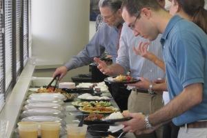 Students at the US Foreign Policy Opening Reception enjoy Thai food.